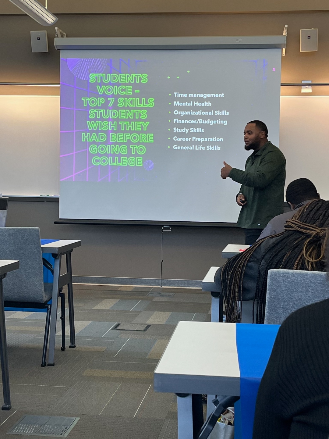 Dr. Barry Hall II delivering a keynote on the Top 7 Skills students wish they had before college